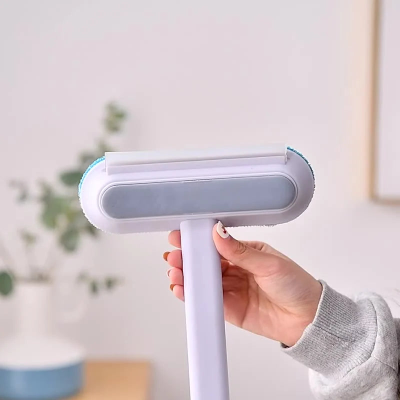 Supplier catalog view of the brush held in one hand